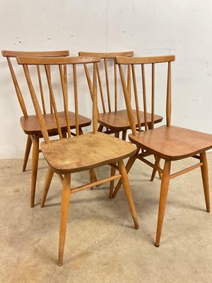 Lot 737 - A set of four Ercol stick back kitchen chairs,...