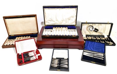 Lot 1047 - An early 20th century walnut cased set of six mother of pearl fish knives and forks