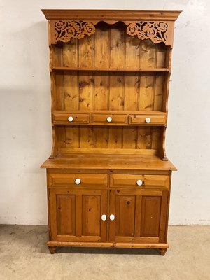 Lot 749 - A moden pine kitchen dresser (one piece) with...