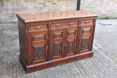 Lot 112 - A late Victorian walnut sideboard with three...