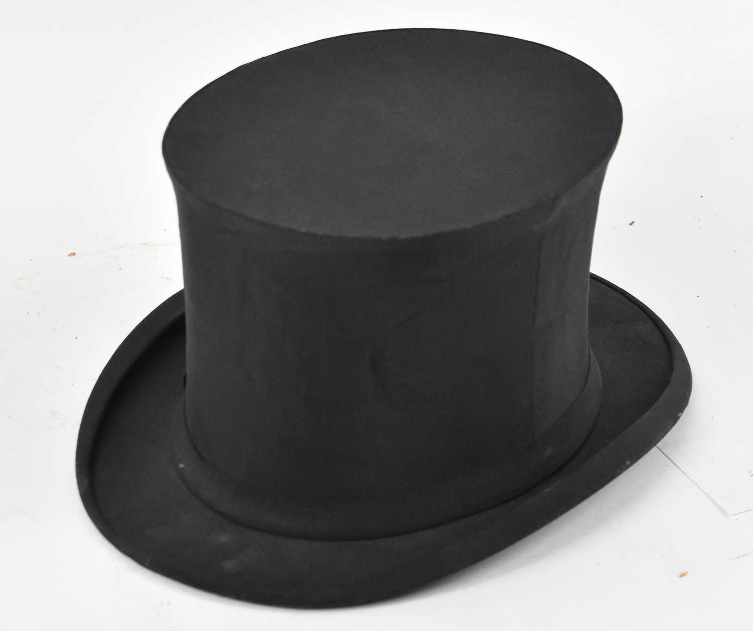 Lot 246 SCOTT & CO; a black collapsible top hat.