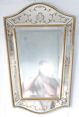 Lot 64 - A decorative Venetian style wall mirror with...