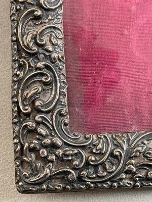 Lot 427 - A small hallmarked silver photo frame with...