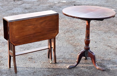 Lot 1631 - A 19th century circular tilt-top tripod table