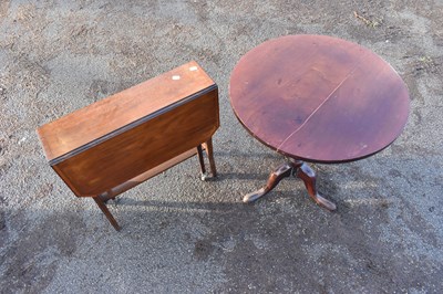 Lot 1631 - A 19th century circular tilt-top tripod table