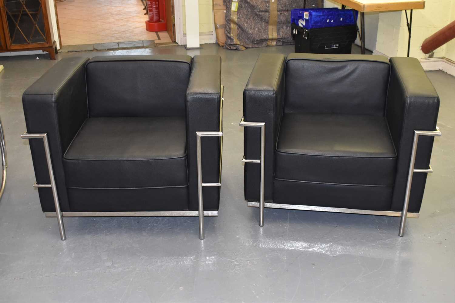 Lot 28 - A pair of stylish contemporary chrome framed...
