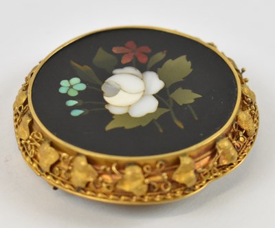 Lot 888 - An Italian Pietra Dura floral brooch set in...