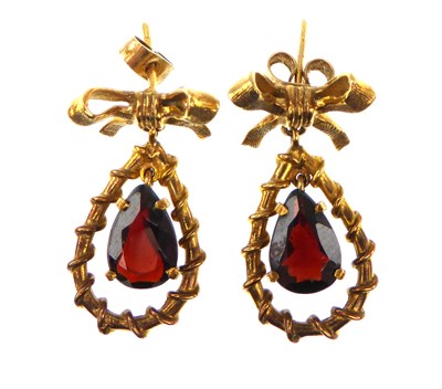 Lot 1041 - A pair of early 20th century 9ct gold earrings...