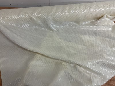 Lot 181 - A 38m roll of ivory raw figured silk, width...