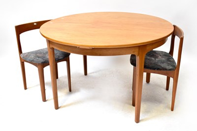 Lot 78 - NATHAN; a 1970s teak circular extending dining...