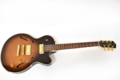 Lot 209 - YAMAHA; a semi-acoustic AEX520 electric guitar.