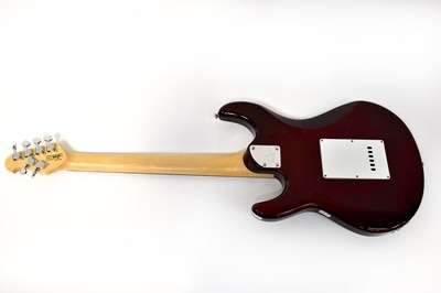 Lot 217 - A red electric guitar with white motif to neck.