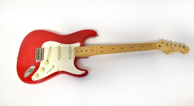 Lot 570 - FENDER; a Stratocaster electric guitar with...