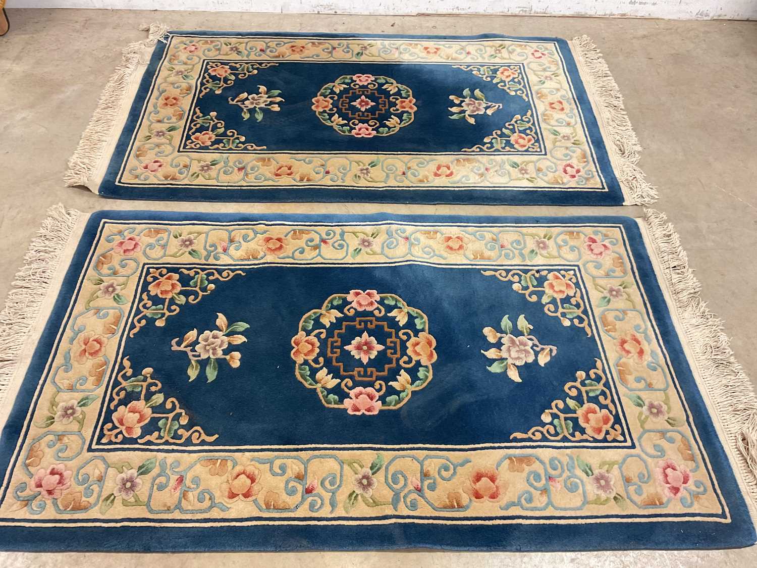 Super Chinese Rug Lot 649 - A pair of Chinese superwash rugs, 170 x 92cm.
