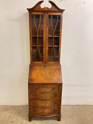 Lot 734 - A small mahogany bureau bookcase, the shelves...