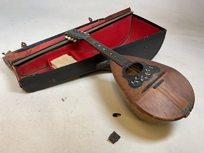 Lot 299 - A circa 1900 Neopolitan barrel backed mandolin...