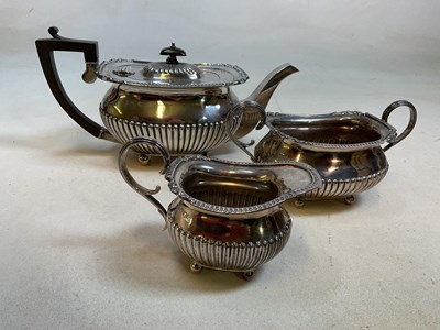 Lot 416 - A George V hallmarked silver three piece tea...