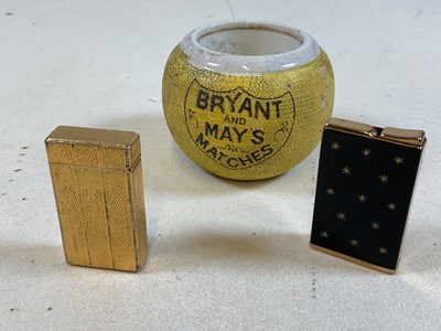 Lot 13 - A Bryant and May match striker, a Colibri...