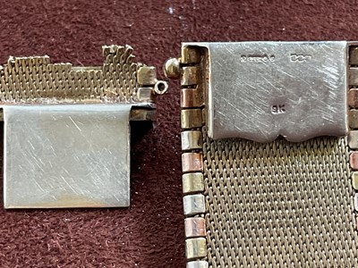 Lot 538 - A 9ct three tone gold broad flat link bracelet,...