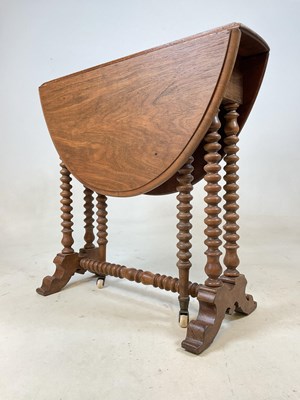 Lot 770 - A late Victorain walnut Sutherland table of...