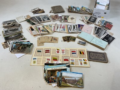 Lot 315 - A quantity of postcards and an autograph album.