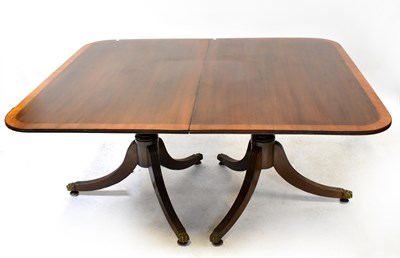 Lot 7 - A 19th century crossbanded mahogany extending...