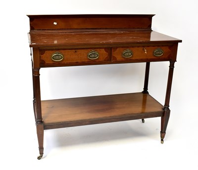 Lot 61 - An Edwardian crossbanded mahogany two-tier...