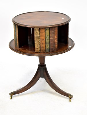 Lot 1 - A 19th century mahogany drum-form revolving...