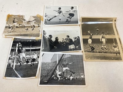 Lot 69 - MANCHESTER UNITED F.C; five black and white...