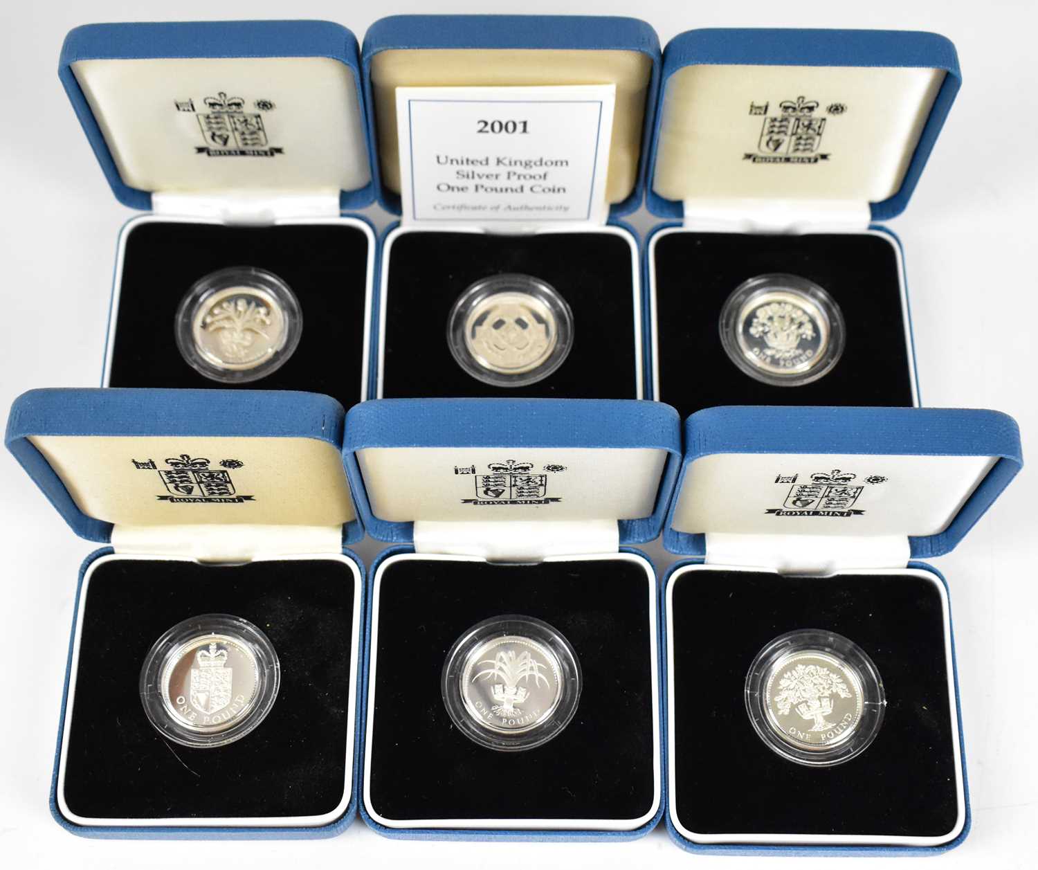 Lot 886 - ROYAL MINT; six silver proof £1 coins, dates...