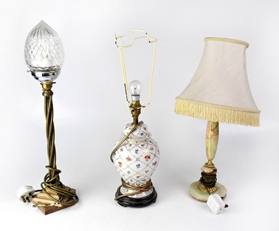 Lot 96 - Three non-matching table lamps, comprising an...