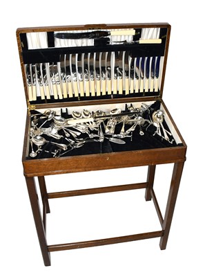 Lot 1039 - An oak cased table canteen of silver plated cutlery