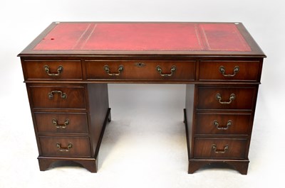 Lot 23 - A Georgian-style mahogany pedestal desk with...