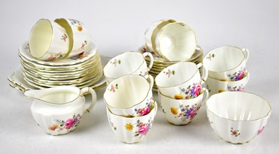 Lot 517 - ROYAL CROWN DERBY; a twelve setting tea servicein the Derby Posies pattern