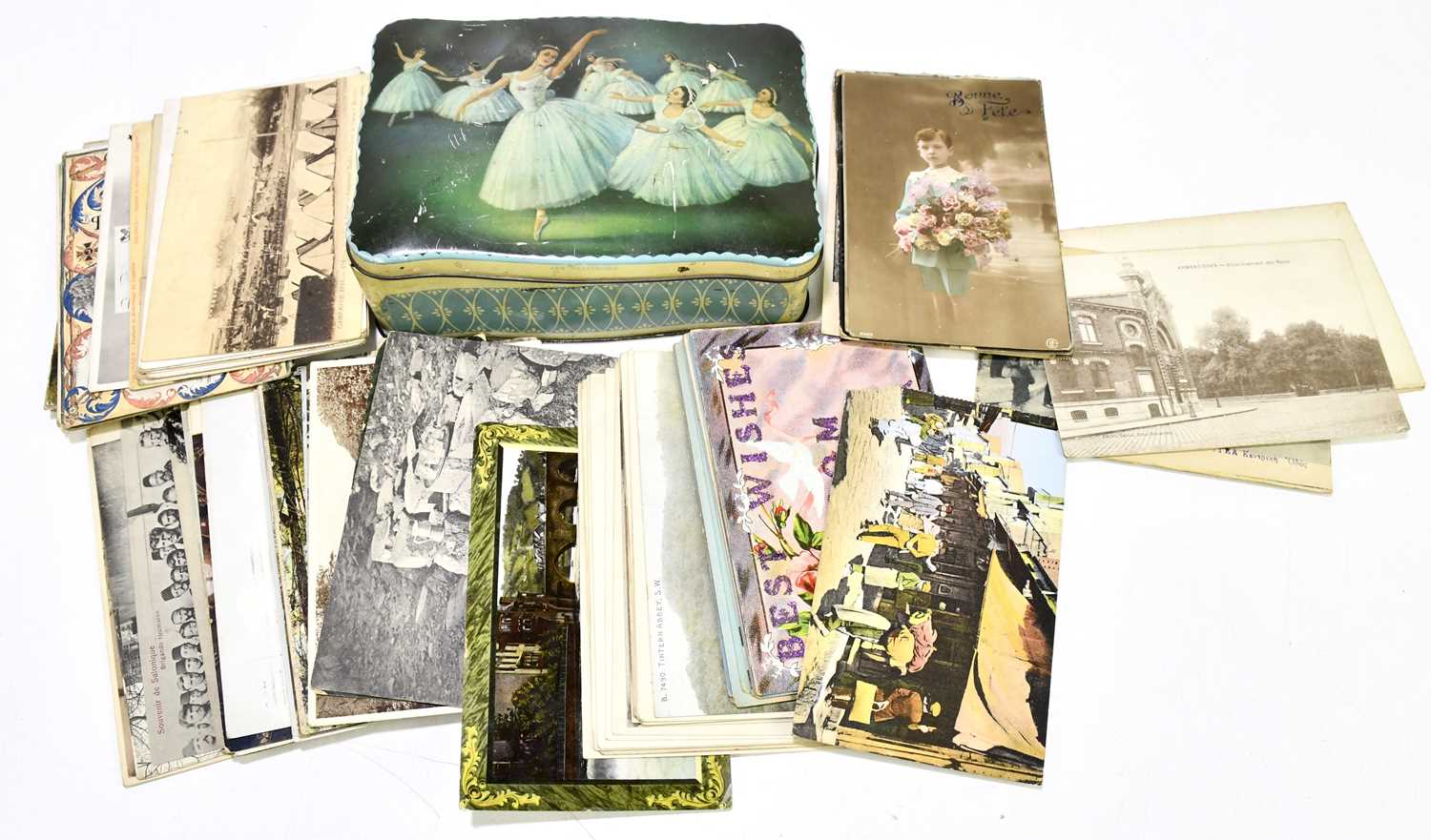 Lot 954 - A small collection of postcards to include