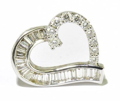 Lot 241 - A white metal pierced heart shaped pendant set...