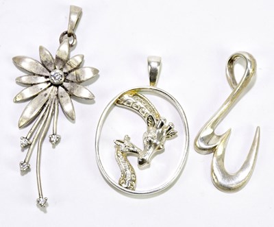 Lot 263 - CATHERINE BEST; three silver pendants, one set...