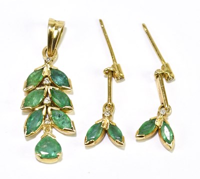 Lot 324 - An 18ct yellow gold emerald and diamond...