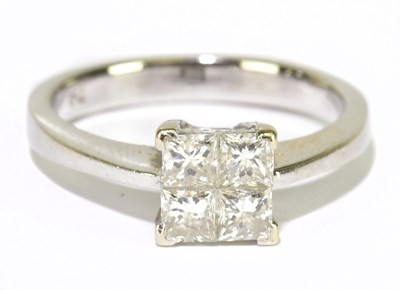 Lot 42 - An 18ct white gold and diamond ring set with...