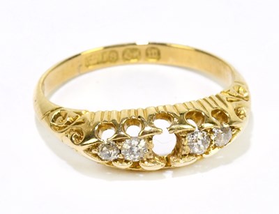 Lot 69A - WITHDRAWN - An 18ct gold ring set with four...