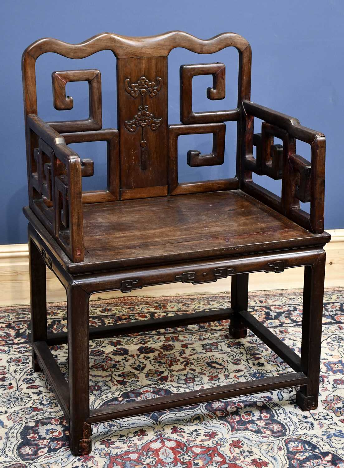 Lot 2235 - A large Chinese huanghuali elbow chair with...