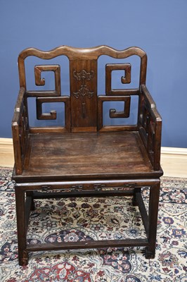 Lot 2235 - A large Chinese huanghuali elbow chair with...