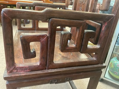 Lot 2235 - A large Chinese huanghuali elbow chair with...