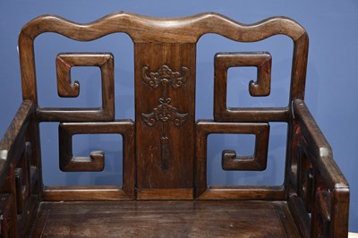 Lot 2235 - A large Chinese huanghuali elbow chair with...