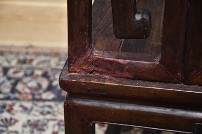 Lot 2235 - A large Chinese huanghuali elbow chair with...