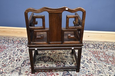 Lot 2235 - A large Chinese huanghuali elbow chair with...