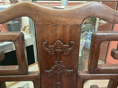 Lot 2235 - A large Chinese huanghuali elbow chair with...