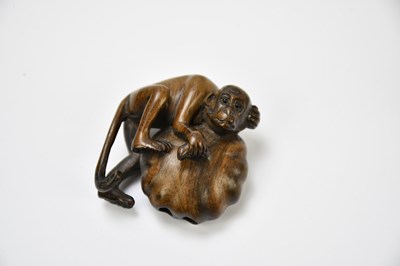 Lot 2288 - Two contemporary carved wooden netsuke, one...