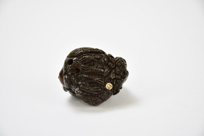 Lot 2288 - Two contemporary carved wooden netsuke, one...