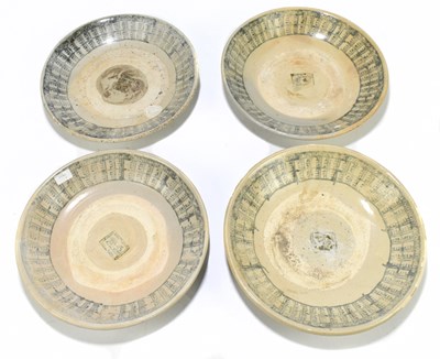 Lot 1016 - Four large Chinese Tek Sing Cargo shallow bowls with simple stylised borders